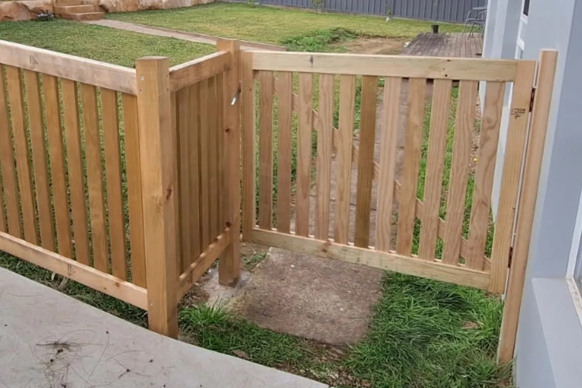 Timber batten side access gate and landscaped yard return